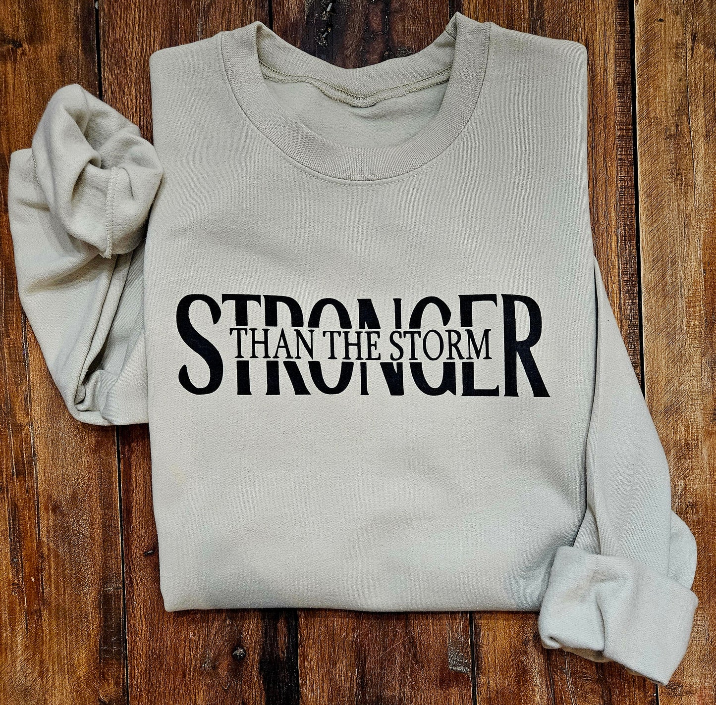 Stronger Than The Storm Sweatshirt (Adult)