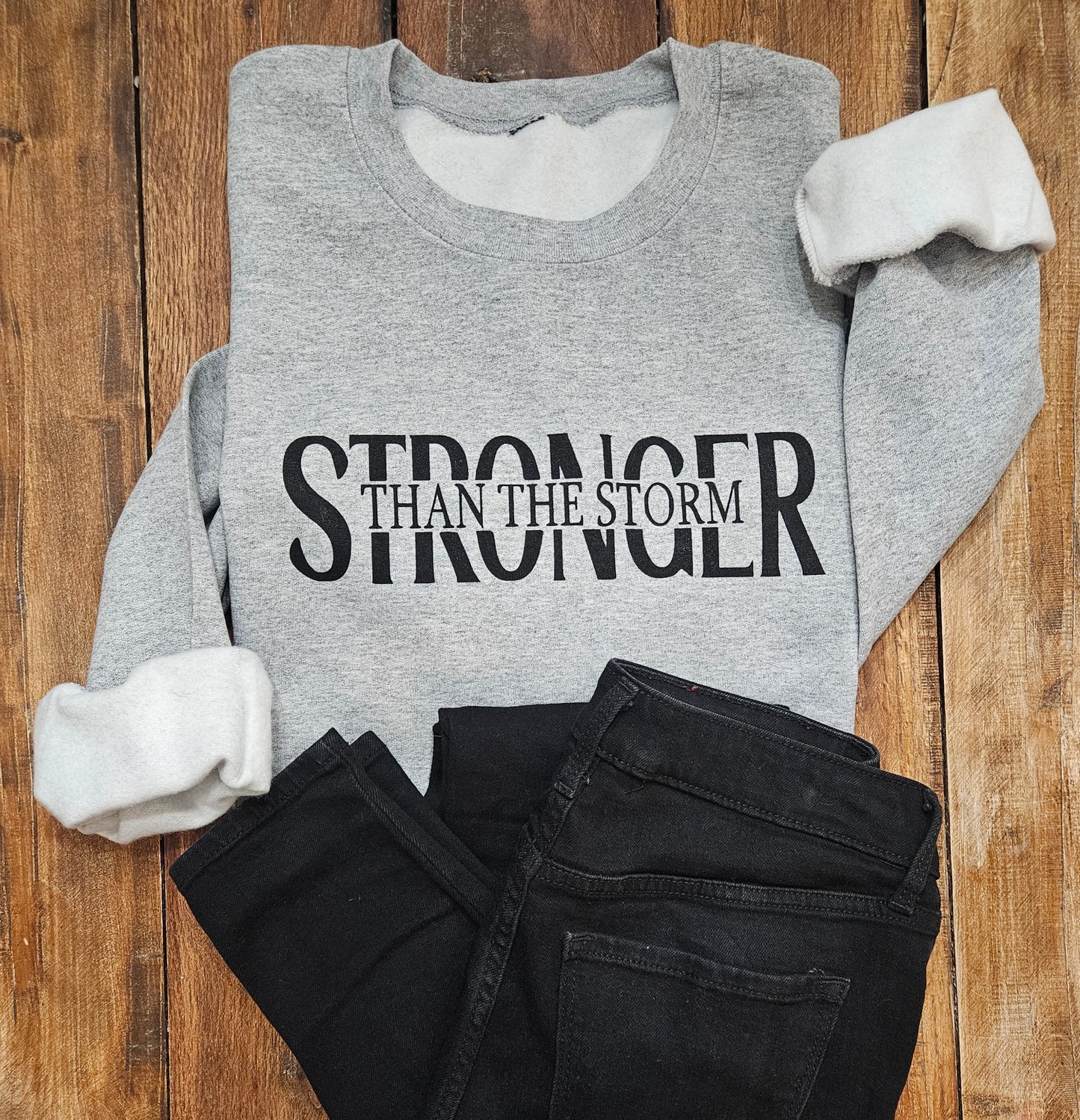 Stronger Than The Storm Sweatshirt (Adult)