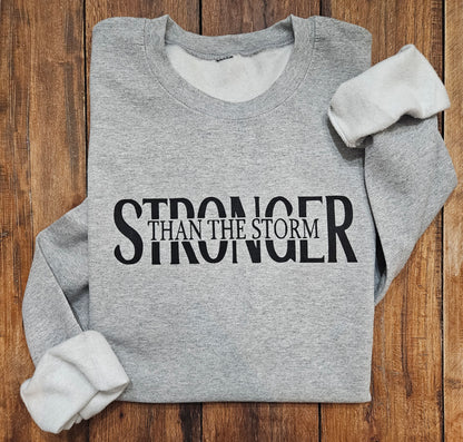 Stronger Than The Storm Sweatshirt (Adult)